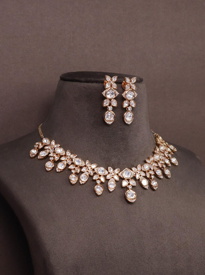 A closeup image of Krisha Diamond Necklace Set by Live Some India on a brown dummy 