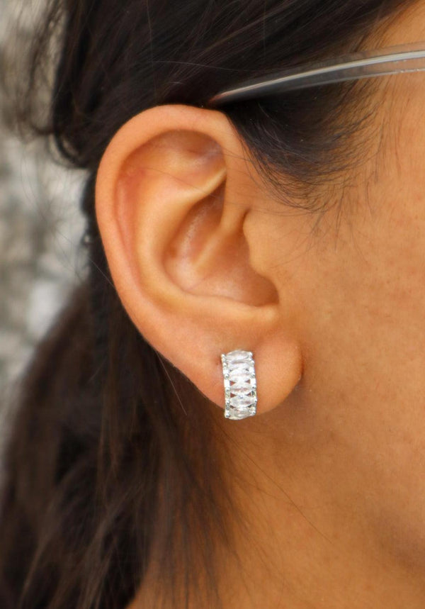 A closeup image of a girl wearing Ladder Earrings by Live Some India 