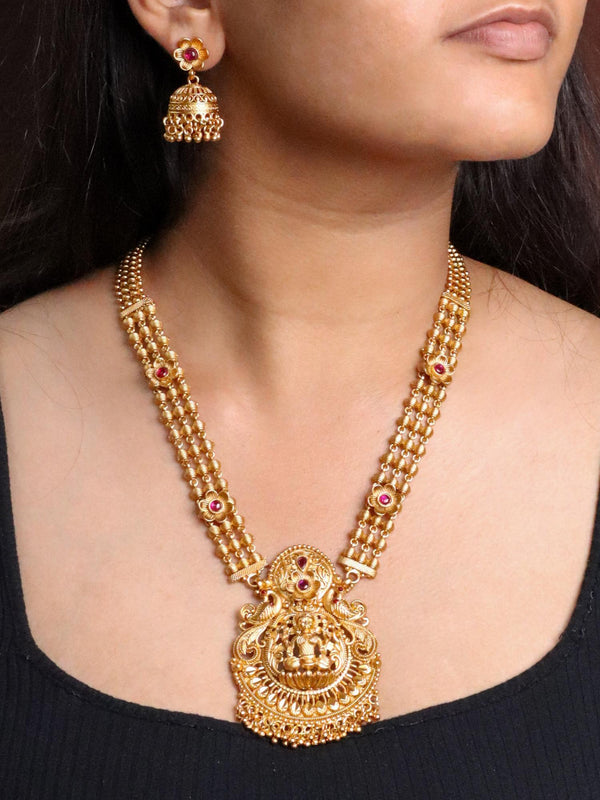 A closeup image of airl wearmng Laxmi Mata 18K Gold Plated Temple Jewellery -1 by Live Some India