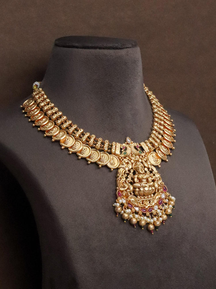 Laxmi Mata Temple Necklace Set with Coins by Live Some India on a brown mannequin.