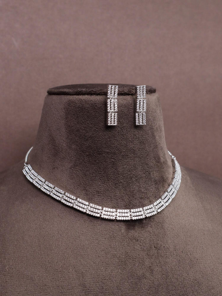 A closeup image of Layered Choker Diamond Necklace Set -1  by Live Some India on a brown dummy 