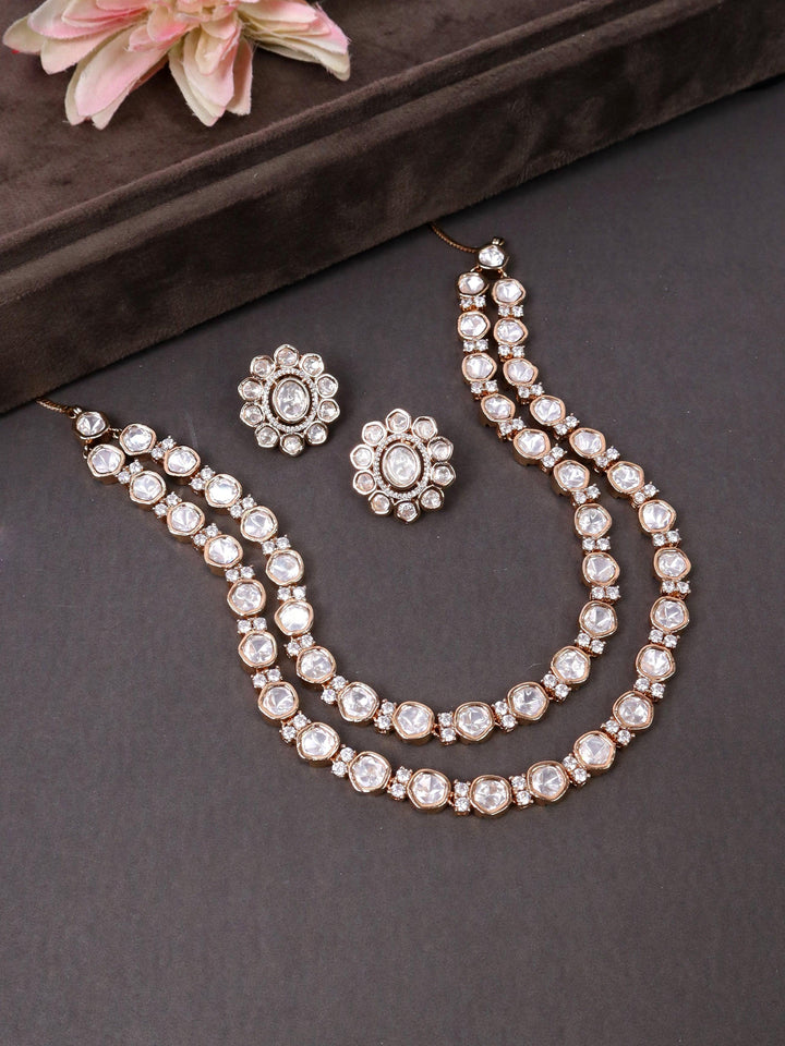 A closeup image of Layered Moissanite Kundan Polki Necklace Set -1 by Live Some India on a black background