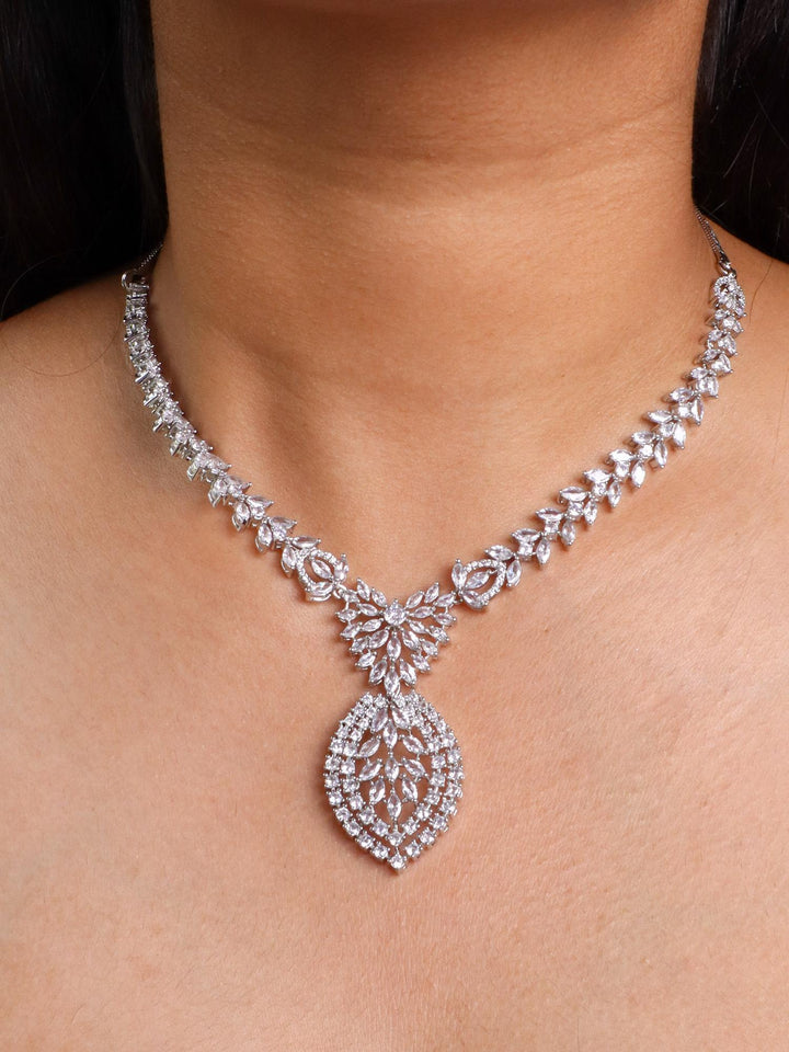 A closeup image of a girl wearing Leaf Studded Diamond Necklace Set -5 by Live Some India 