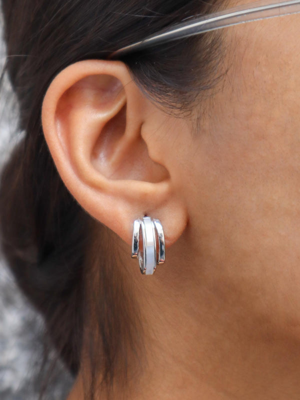 A closeup image of a girl wearing inear Half Hoops by Live Some India 