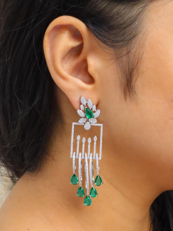 Girl wearing Manvi Designer Diamond Dangle Earrings by Live Some India