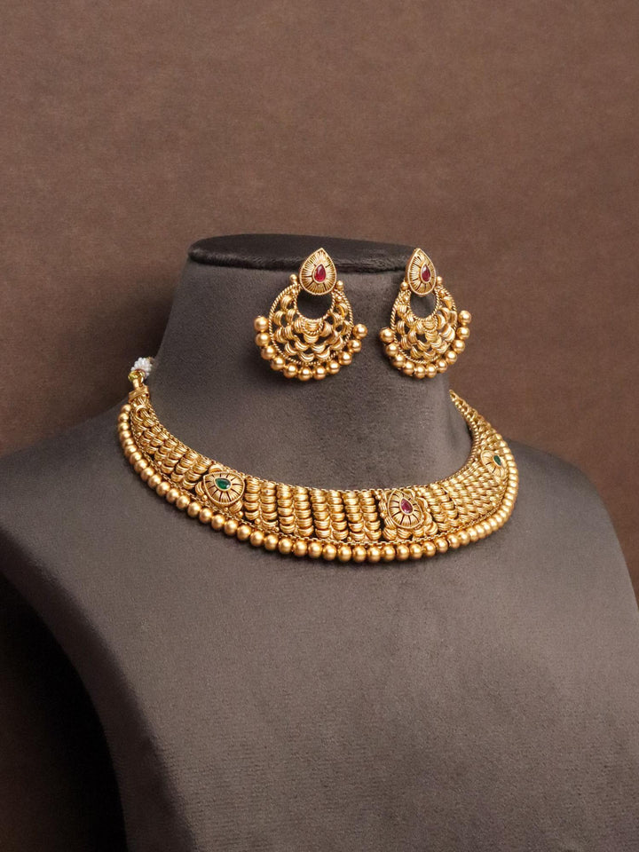 Manya Traditional Temple Necklace Set by Live Some India on a brown mannequin