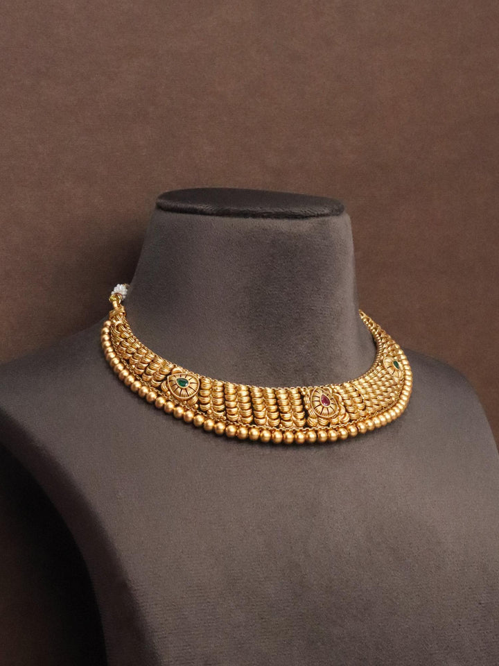 Manya Traditional Temple Necklace Set by Live Some India on a brown mannequin