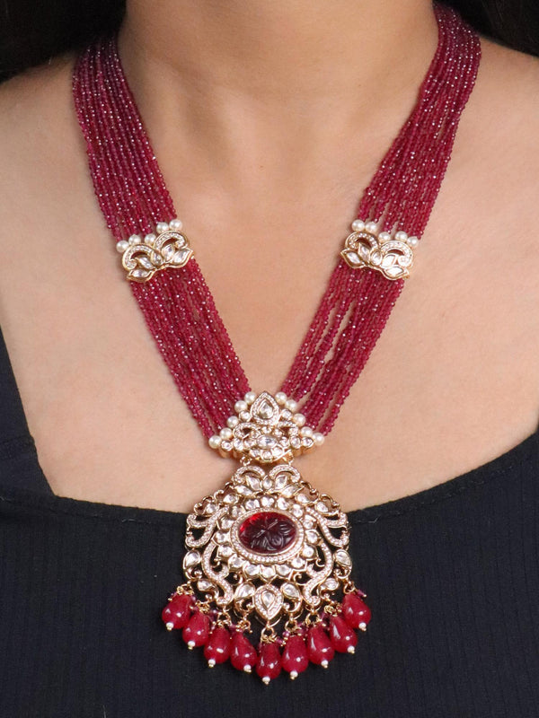 A closeup image of a girl wearing Mayur Kundan Polki Necklace Set-1 by Live Some India 