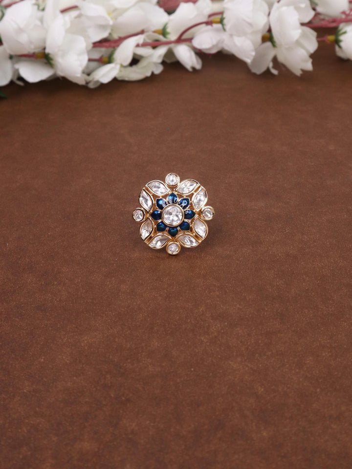 A closeup image of Mehar Meenakari Kundan Polki Blue Ring -1 by Live Some India on a brown background