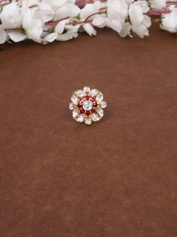 A closeup image of Mehar Meenakari Kundan Polki Red  Ring -1 by Live Some India on a brown background