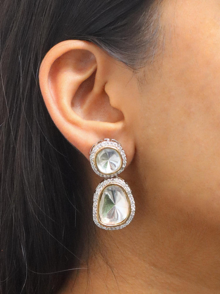 A closeup image of a girl wearing Mini Stellar Polki Contemporary Earrings -1 by Live Some India 