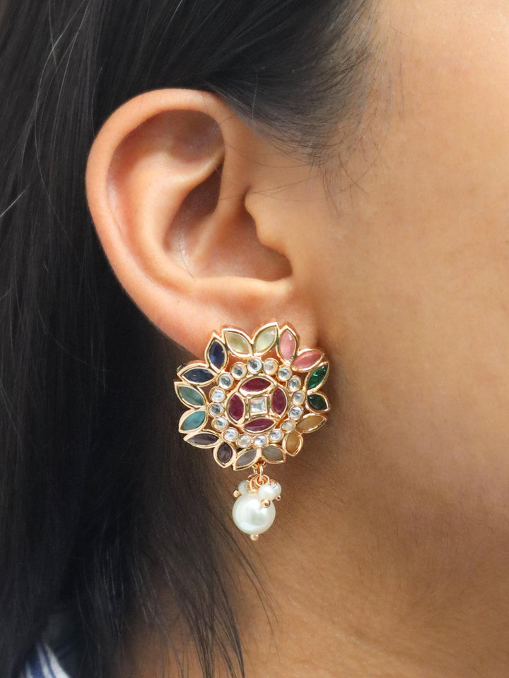 A closeup image of a girl wearing Mithali Kundan Polki Multi Stud Earrings -1 by Live Some India 