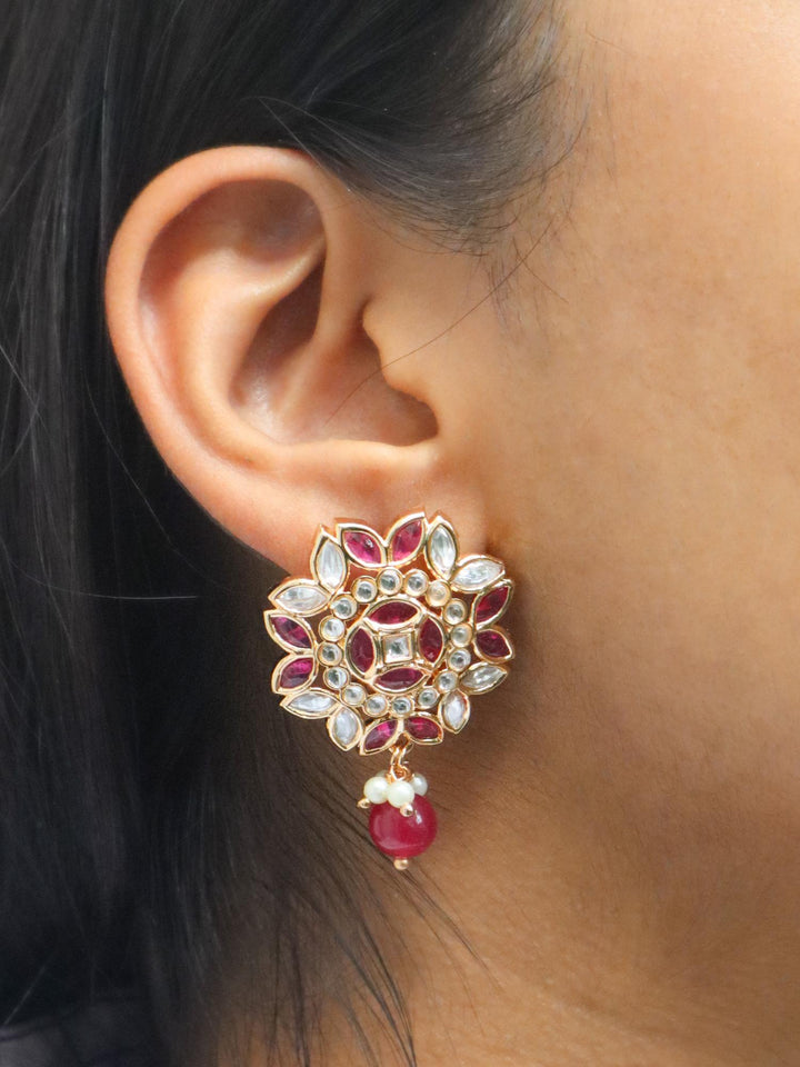 A closeup image of a girl wearing Mithali Kundan Polki Stud Earrings -1 by Live Some India 