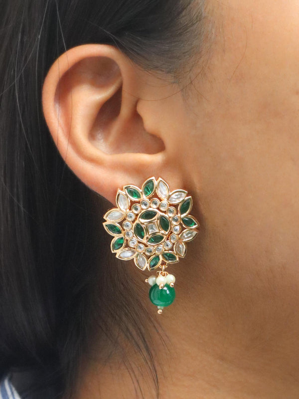 A cloeup image of a girl wearing Mithali Kundan Polki Stud Earrings -1 by Live Some India 