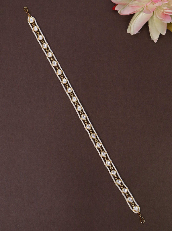 A closeup image of Mohini White Beaded Drop Matha Patti by Live Some India 