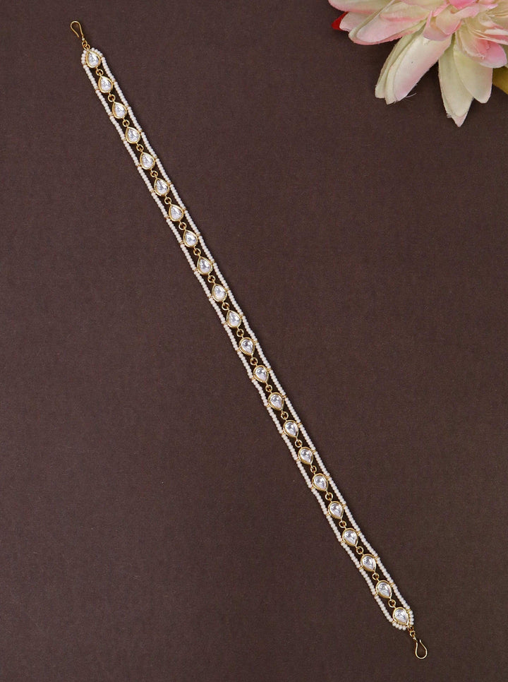 A closeup image of Mohini White Beaded Drop Matha Patti by Live Some India 