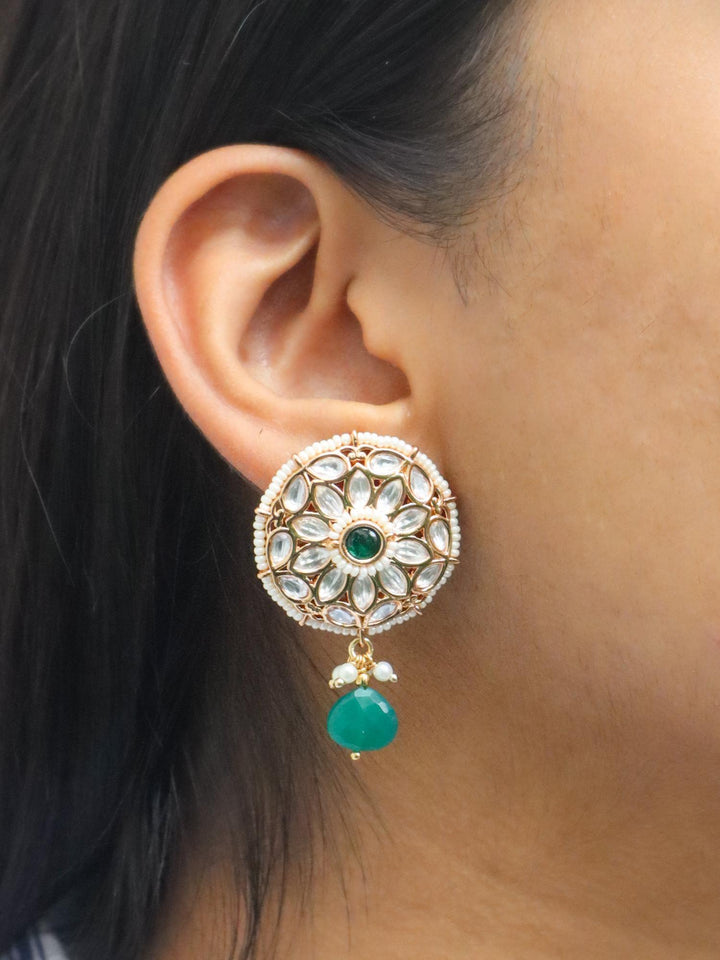 A closeup image of a girl wearing Motif Kundan Polki Dangler Earrings -2 by Live Some India 