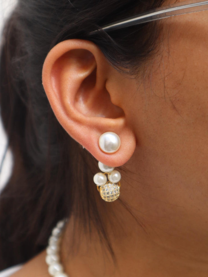 A closeup image of a girl wearing Multi Beaded White Pearl Earrings -1 by Live Some India 