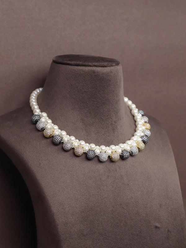 A closeup imaqe of Multi Beaded White Pearl Necklace Set -4 by Live Some India on a brown dummy 