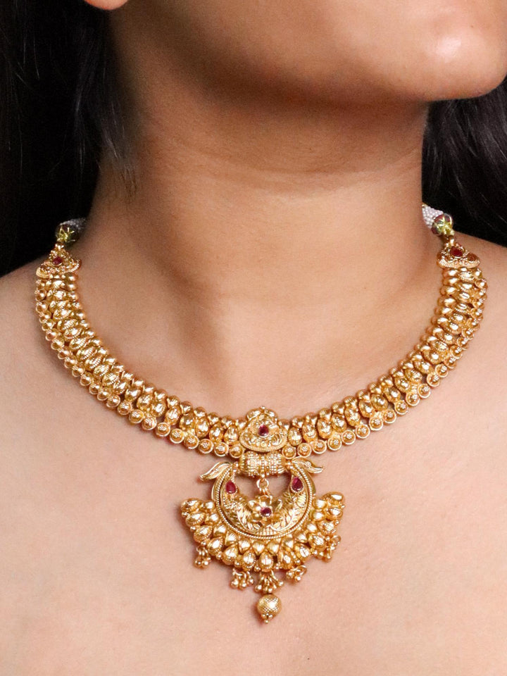 A closeup image of a girl wearing Mya Temple Necklace -5 by Live Some India 