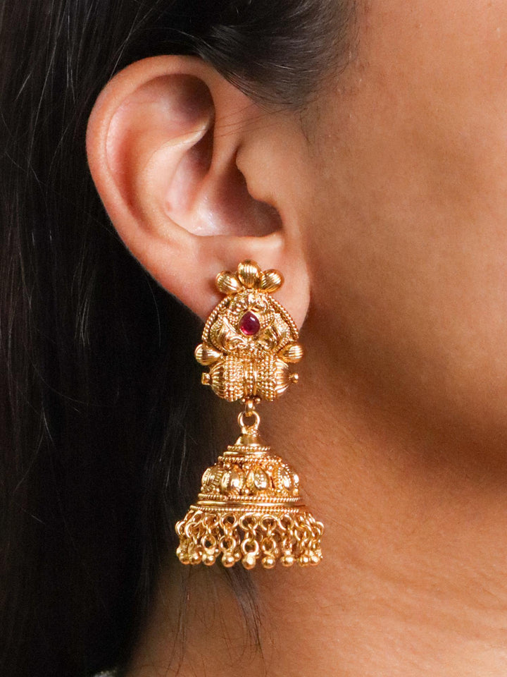 A closeup image of a girl wearing  Mya Temple earrings-4 by Live Some India 