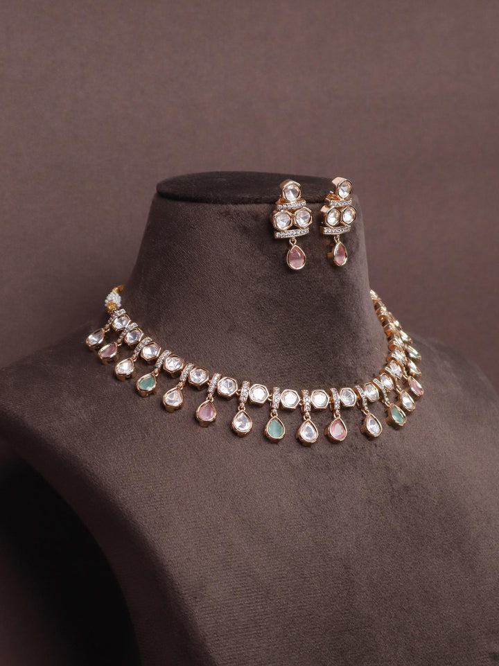 A closeup image of  Myra Kundan Polki Necklace Set -3 by Live Some India on a brown background 