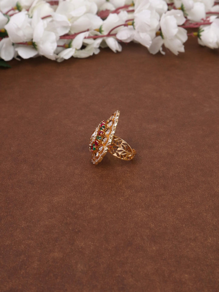 A closeup image of Naina Kundan Polki Multi Ring -1 by Live Some India on a brown background 