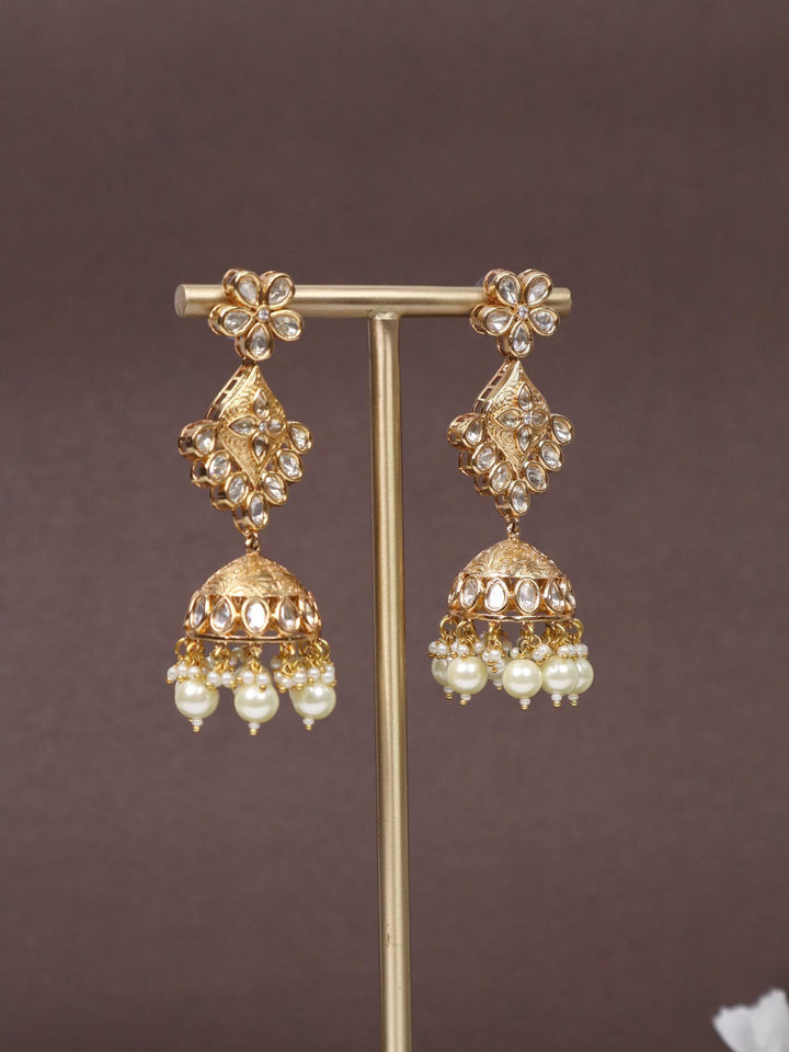 A closeup image of Navras Jhumka Earrings -1 by Live Some India on an earring stand 