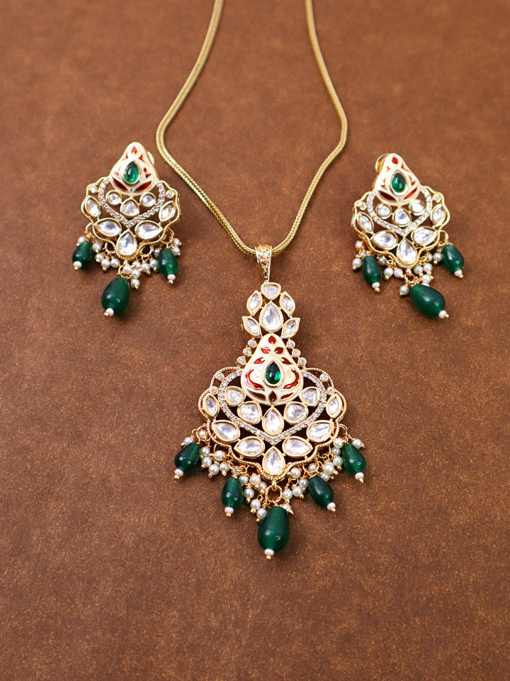 Nia Kundan Polki Green Stone Pendant Set by Live Some India on a brown background