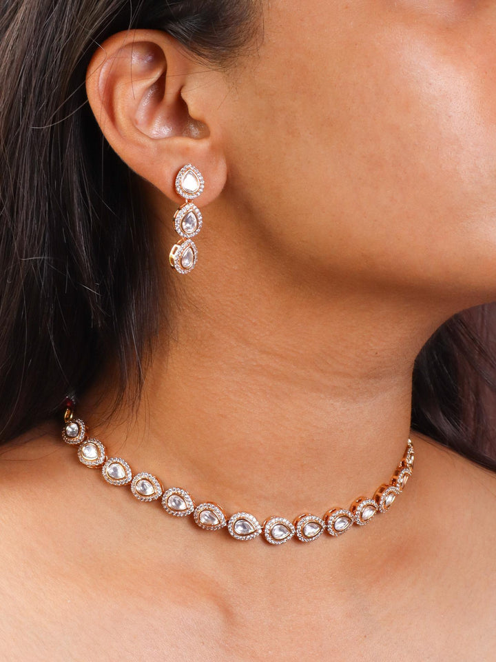 A closeup image of a girl wearing Nira Single Line Kundan Polki Necklace Set -1 by Live Some India 