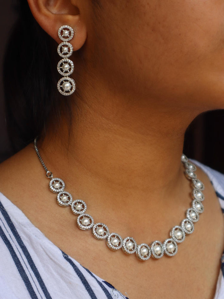 A closeup image of a girl wearing Nitya Pearl Earrings -1 by Live Some India