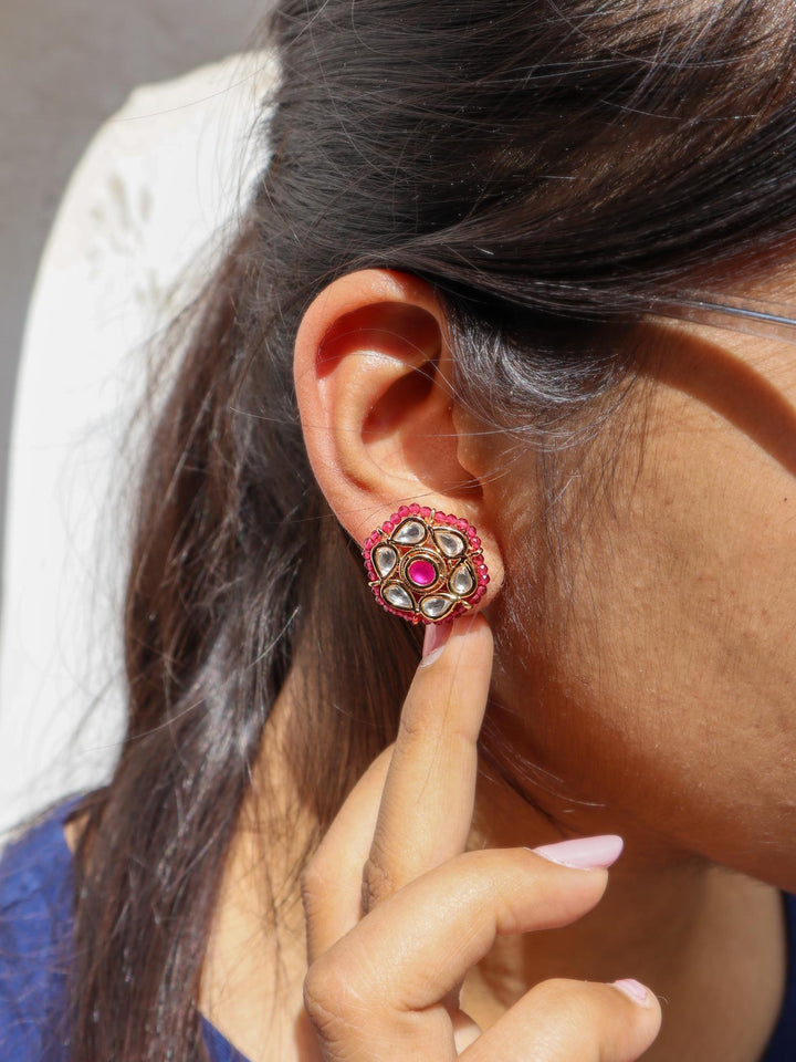 A closeup image of Niva Kundan Polki Stud Earrings by Live Some India