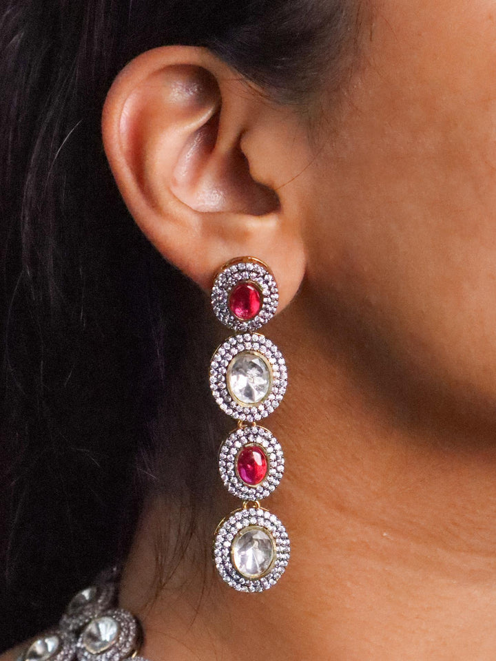 A closeup image of a girl wearing Nivara Kundan Polki Earrings -2 by Live Some India 