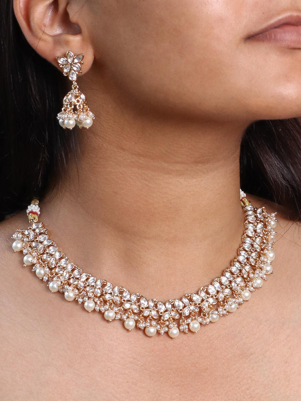 A closeup image of a girl wearing Niyara Kundan Polki Necklace Set -4 by Live Some India 