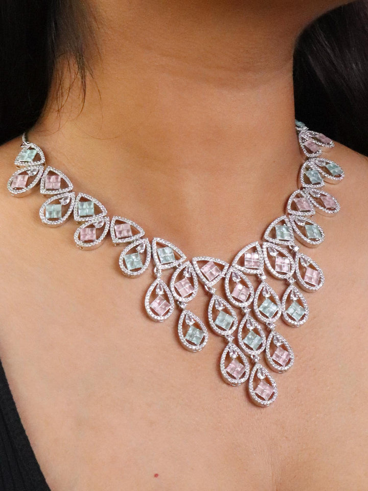 A closeu image of a girl wearing Pastel Love Diamond Necklace Set by Live Some India 