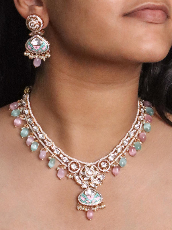 A closeup image of a girl wearing Pastel Reverie Kundan Polki Necklace Set by Live Some India 