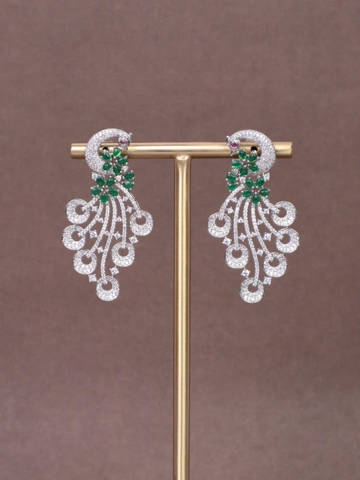 A closeup image of Shades of Peacock Diamond Earrings by Live Some India 