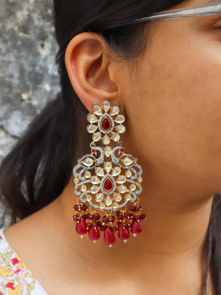 A closeup image of a girl wearing Peacock Kundan Polki Dangler Earrings -1 by Live Some India