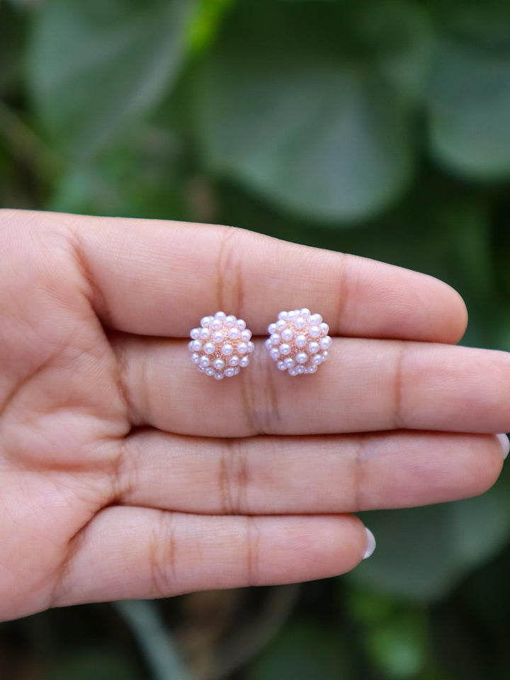 A closeup image of Pearl Ball Earrings by Live Some India 