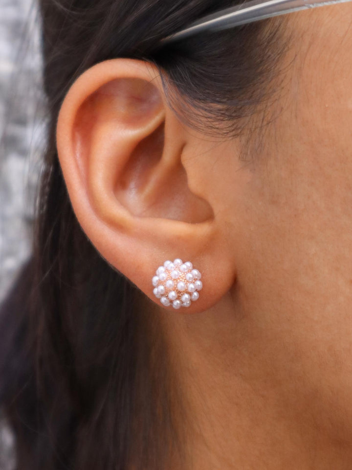 A closeup image of a girl wearing Pearl Ball Earrings -2 by Live Some India 