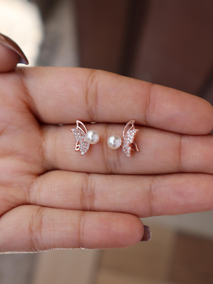 A closeup image of Pearl Butterfly Earrings -1 by Live Some India 