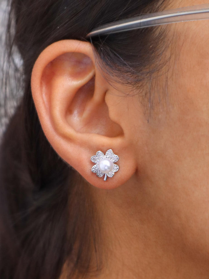 A closeup image of Pearl Centered Leaf Earrings-1 by Live Some India 