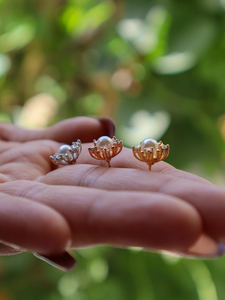 A closeup image of Pearl Studded Star Earrings -1 by Live Some India 