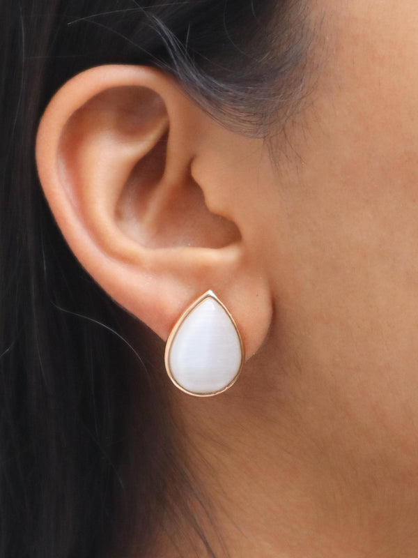 A closeup image of a girl wearing Peer MOP Rose Gold Earrings -1 by Live Some India 