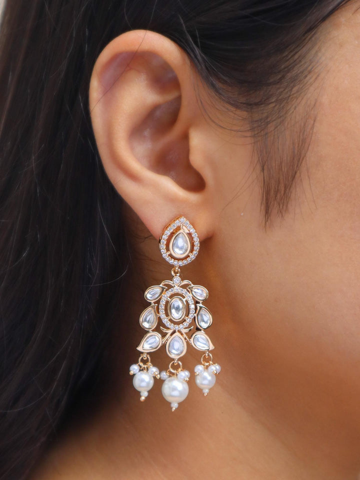 Girl wearing Raha Kundan Polki & Peals Dangle Earrings by Live Some India