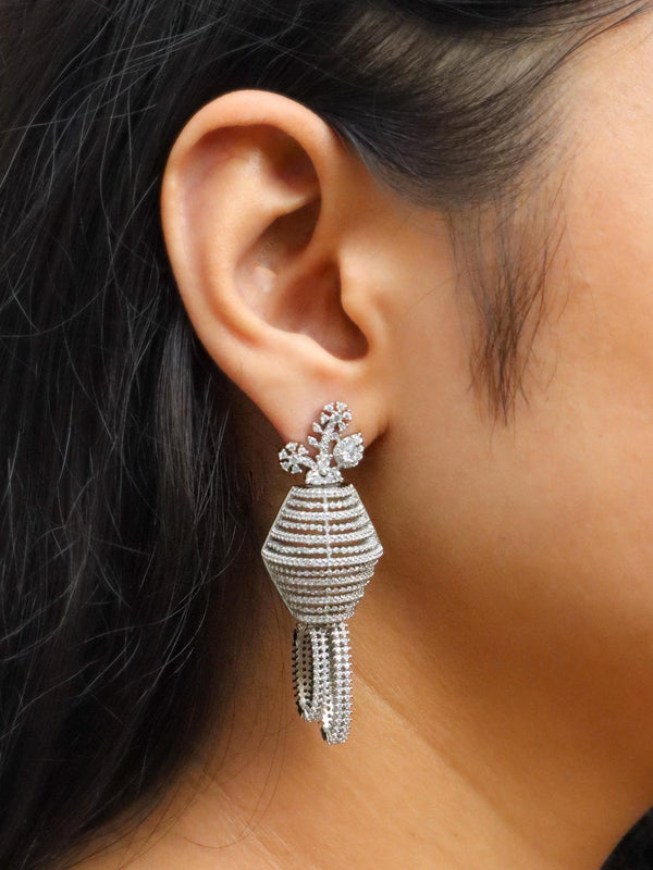 Girl wearing Raya Diamond Dangle Earrings by Live Some India