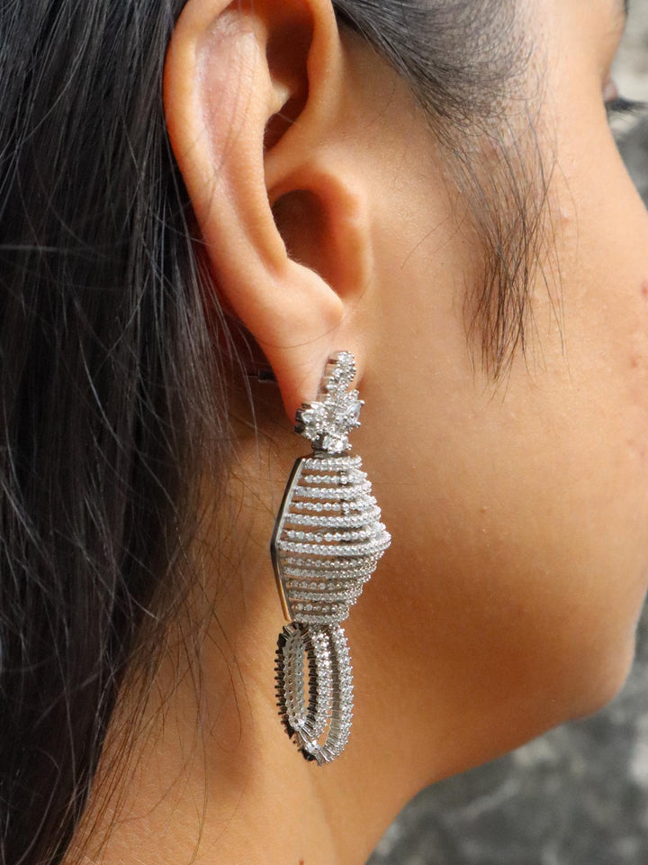 Side view of Girl wearing Raya Diamond Dangle Earrings by Live Some India