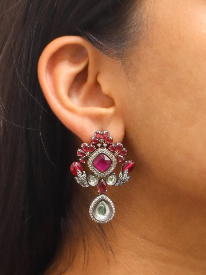 A closeup image of a girl wearing Royal Elegant Polki Contemporary Earrings -1 by Live Some India 