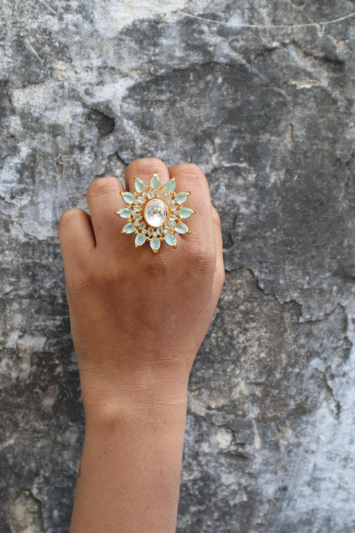 A closeup image of a girl wearing Royal Finish Kundan Polki Ring -2 by Live Some India 