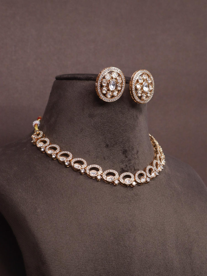 A closeup image of Royal Kundan Polki Necklace Set -3 by Live Some India on a brown dummy 